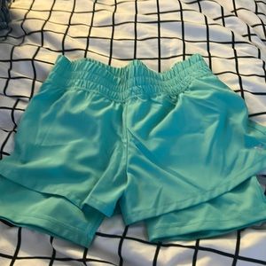 Kids large teal shorts with spandex